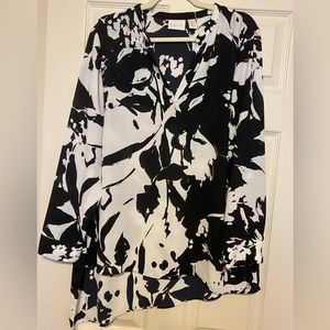 Chico’s Large Black/White Tunic. Asymmetrical hem in back. Button cuffs